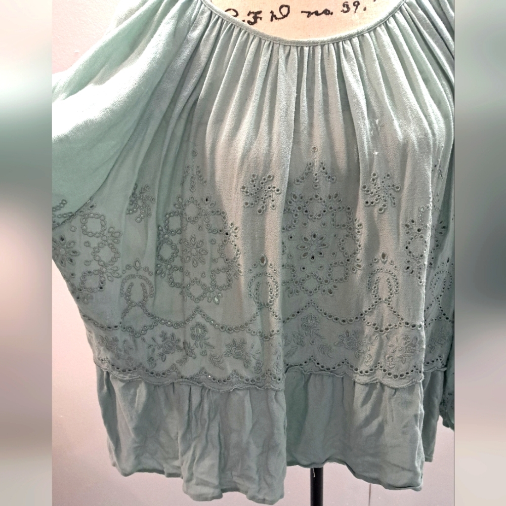 Peplum eyelet peasant blouse